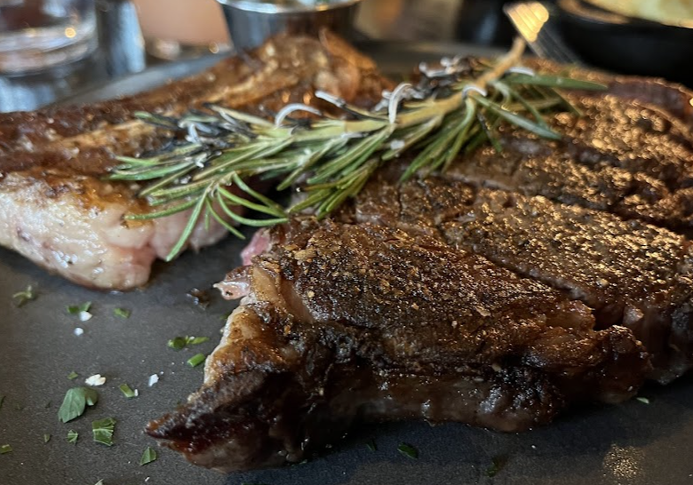 Local Restaurant and Bar signature dishes Buffalo TartareBuffalo WellingtonElk Chop